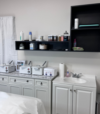 Annie's Beauty and Body Waxing 17 Wax warmers and professional skincare products inside a waxing studio